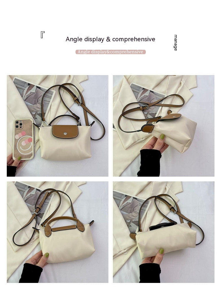 VogueSling Handtasche