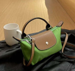 VogueSling Handtasche